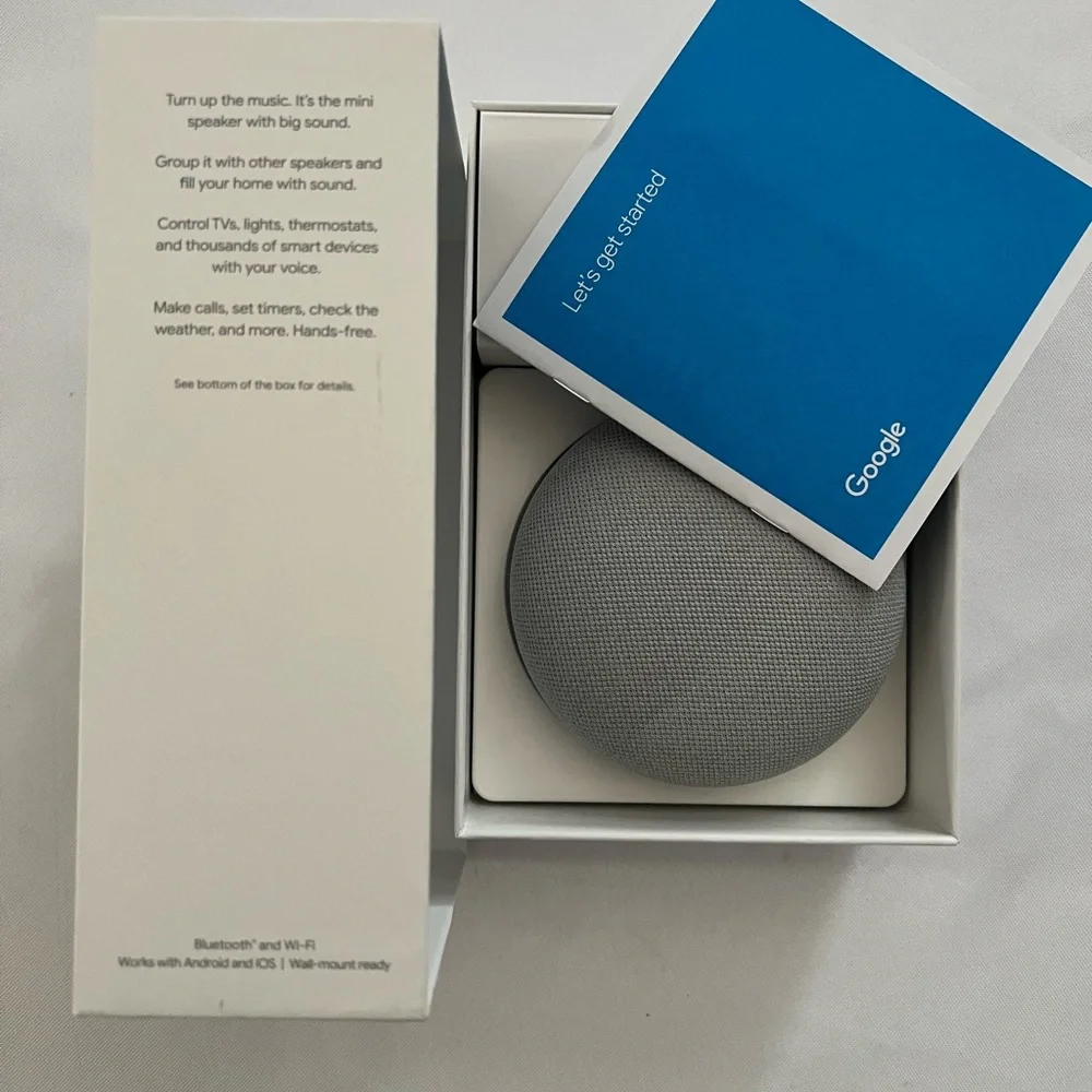 Google Assistant Device Packaging with Blue and White